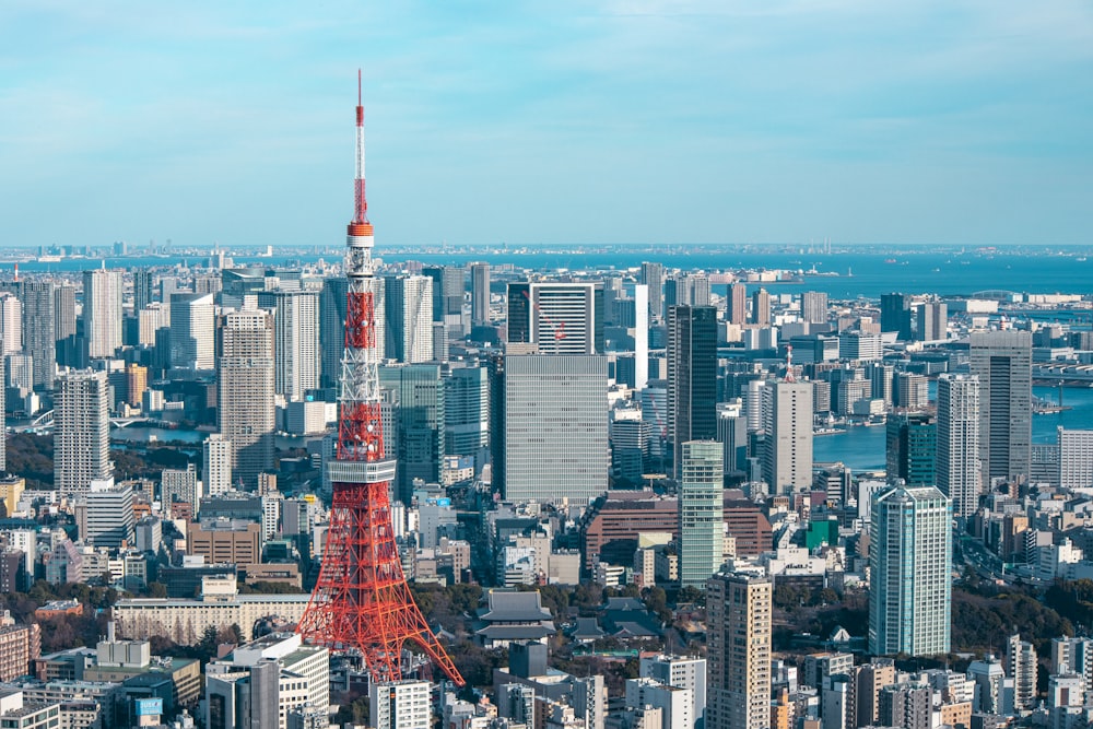 a view of a city with a very tall tower