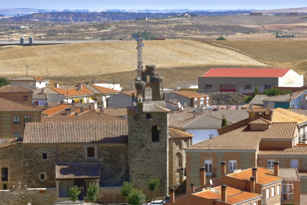 a view of a town with a clock tower