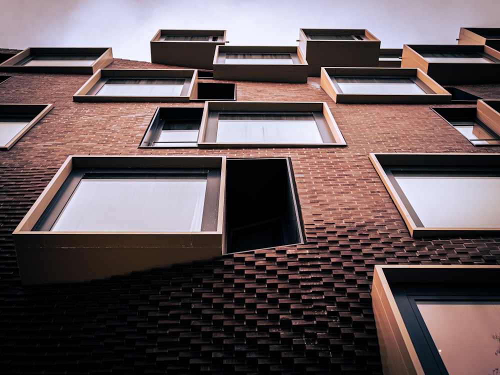 a tall brick building with lots of windows