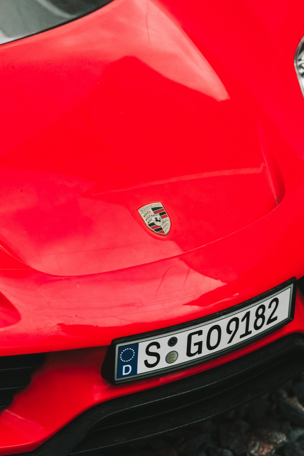 a close up of a red sports car