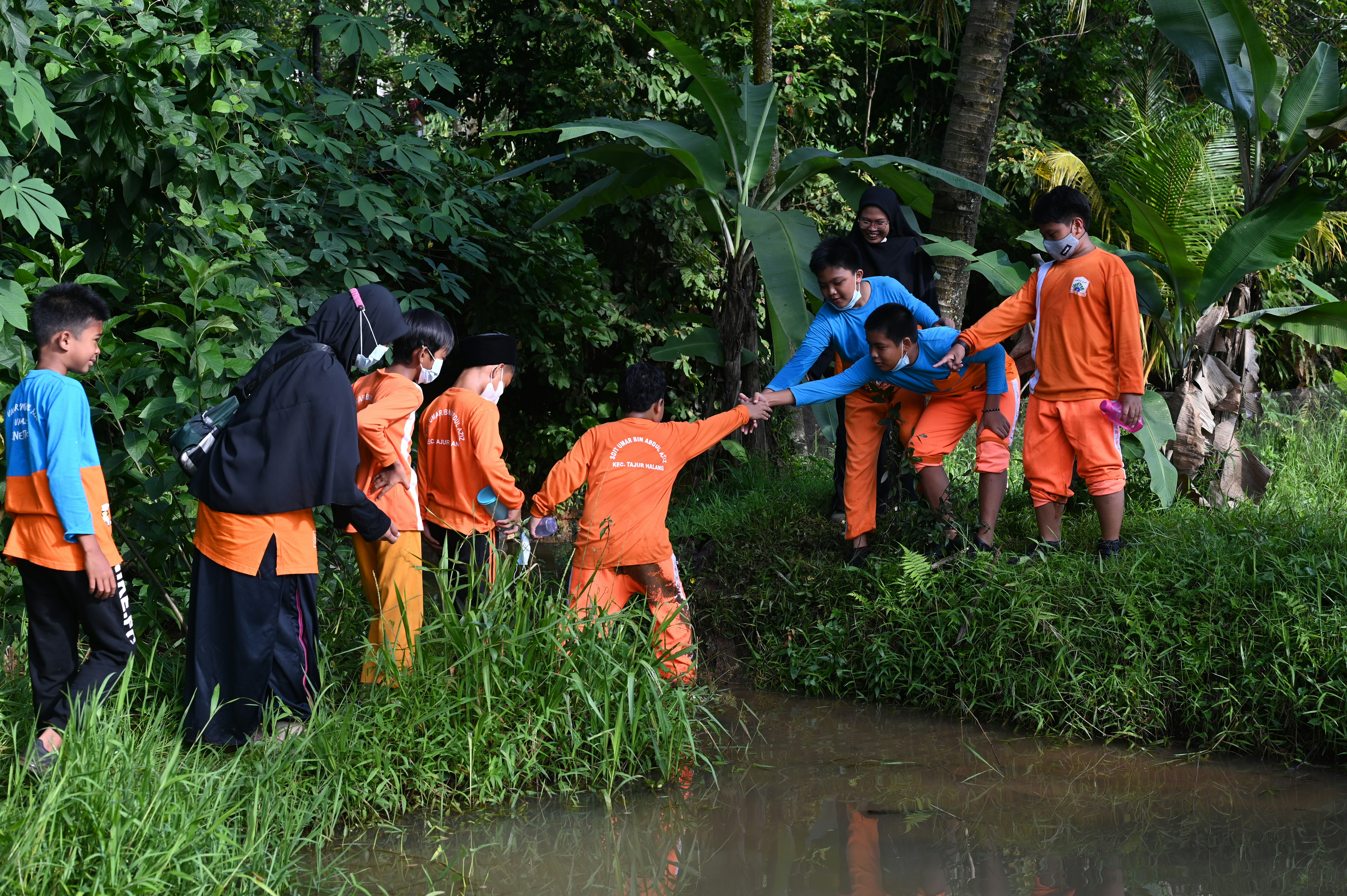 Children learning outdoors