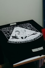 a drawing of a man with a hat on a table