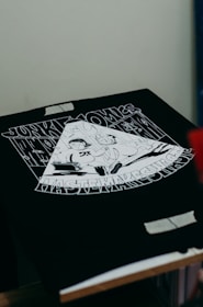 a drawing of a man with a hat on a table