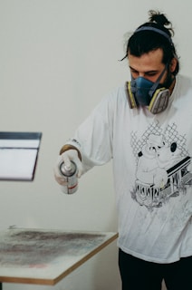 a man wearing a gas mask and gloves