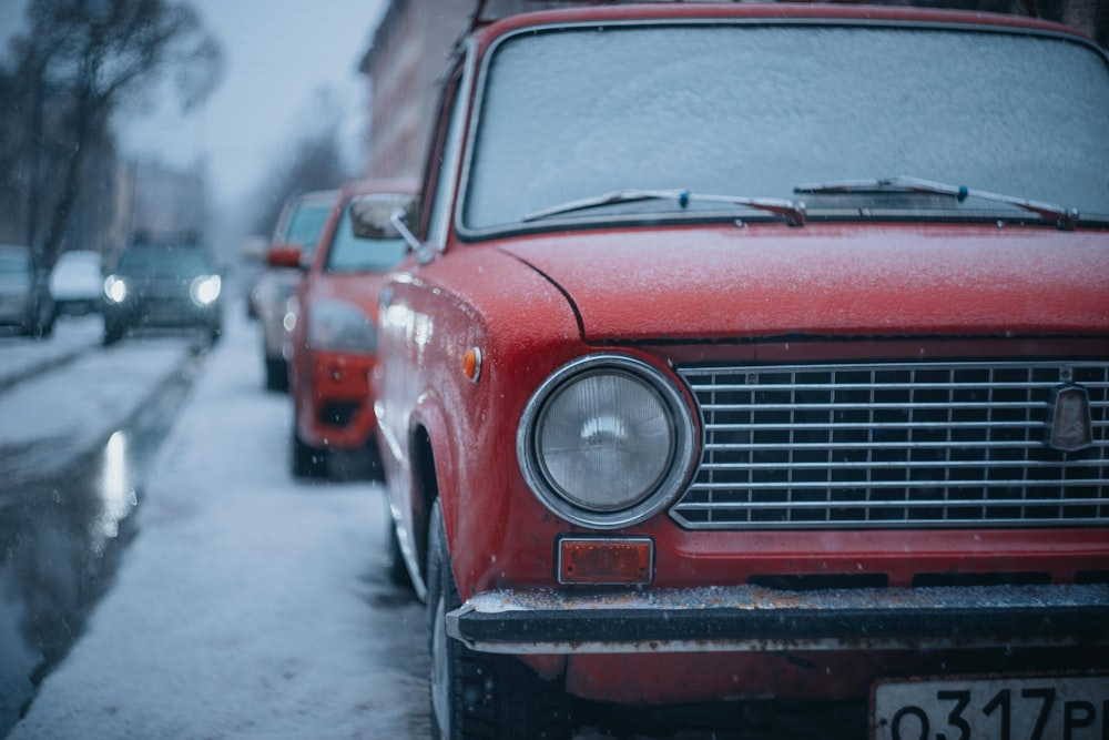 a red car parked on the side of the road