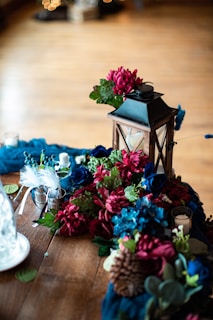 a vase of flowers on a table