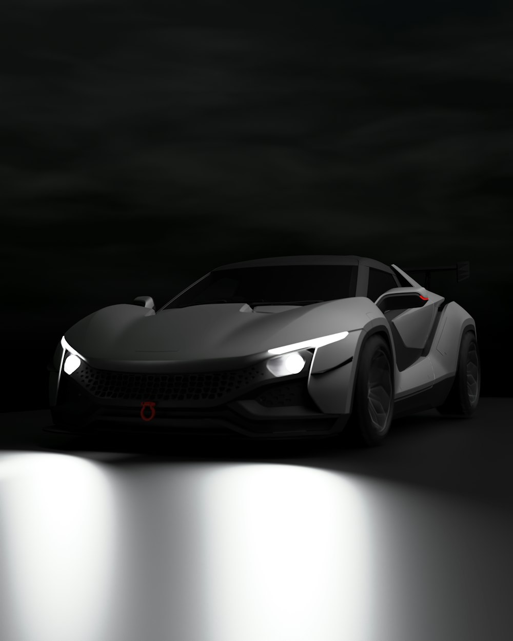 a car is shown in a dark room