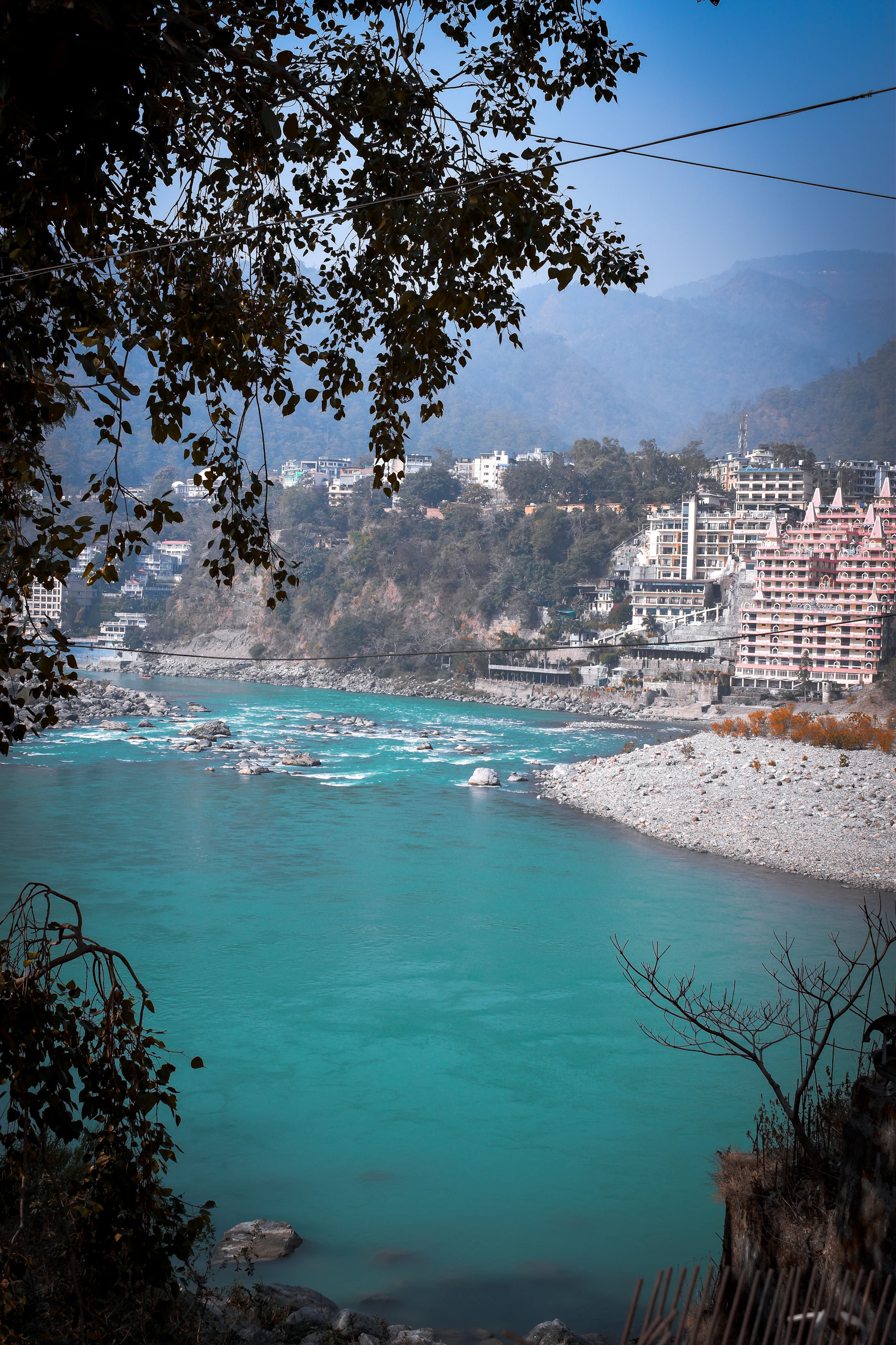 A turquoise bend of the Ganges with a pale sand bank at Rishikesh