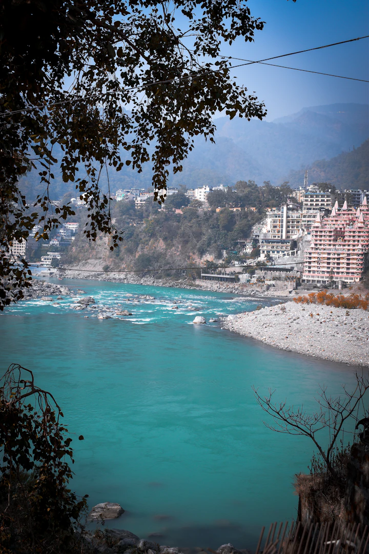 A turquoise bend of the Ganges with a pale sand bank at Rishikesh