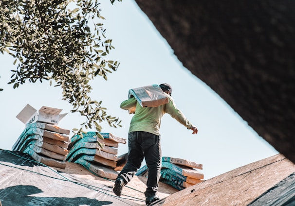 a man riding a skateboard on top of a roof