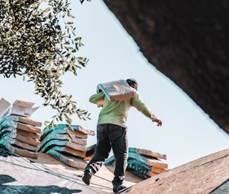 a man riding a skateboard on top of a roof