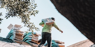 a man riding a skateboard on top of a roof