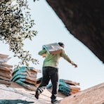 a man riding a skateboard on top of a roof