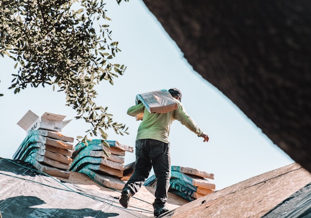 a man riding a skateboard on top of a roof