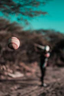 a baseball that is flying in the air