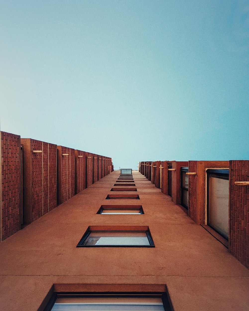 a row of windows on the side of a building