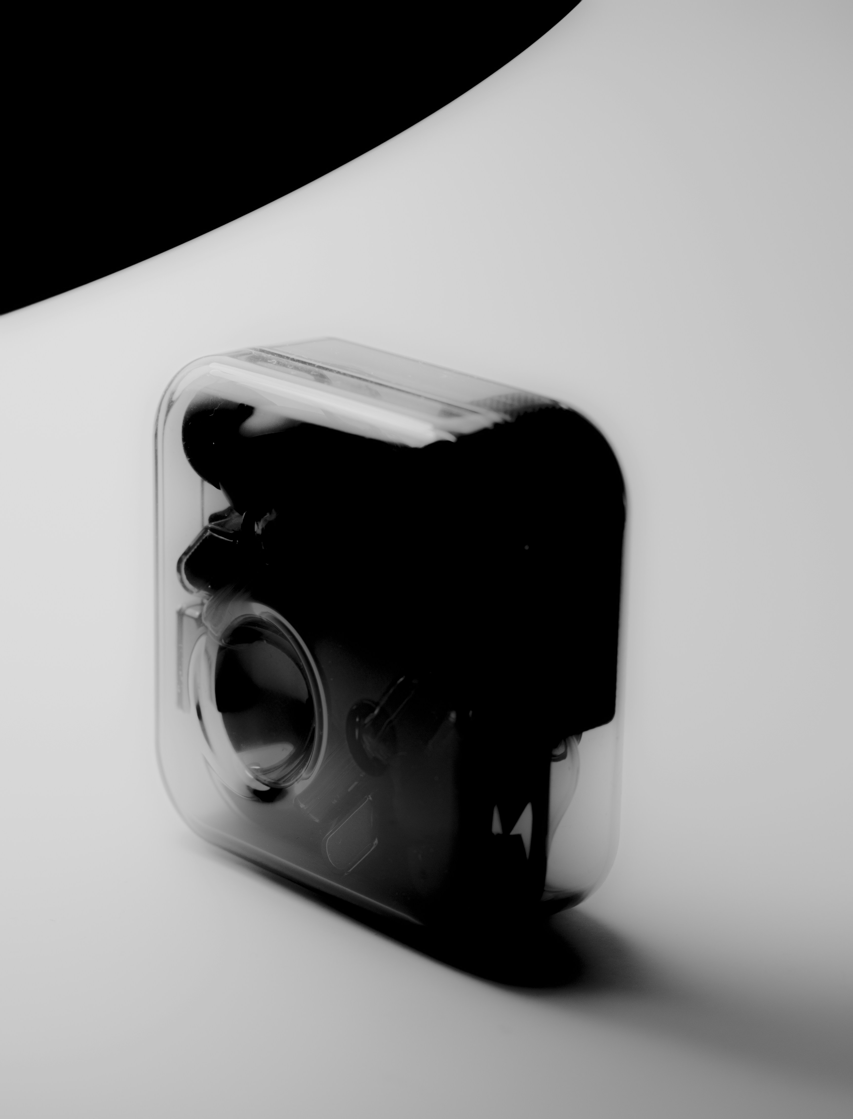 a black and white photo of a camera