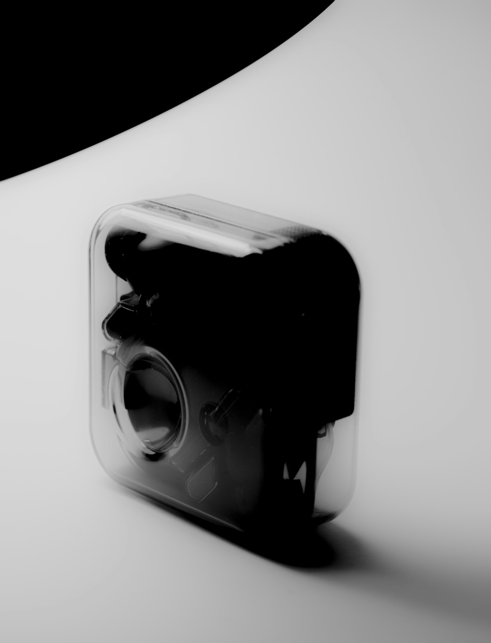 a black and white photo of a camera