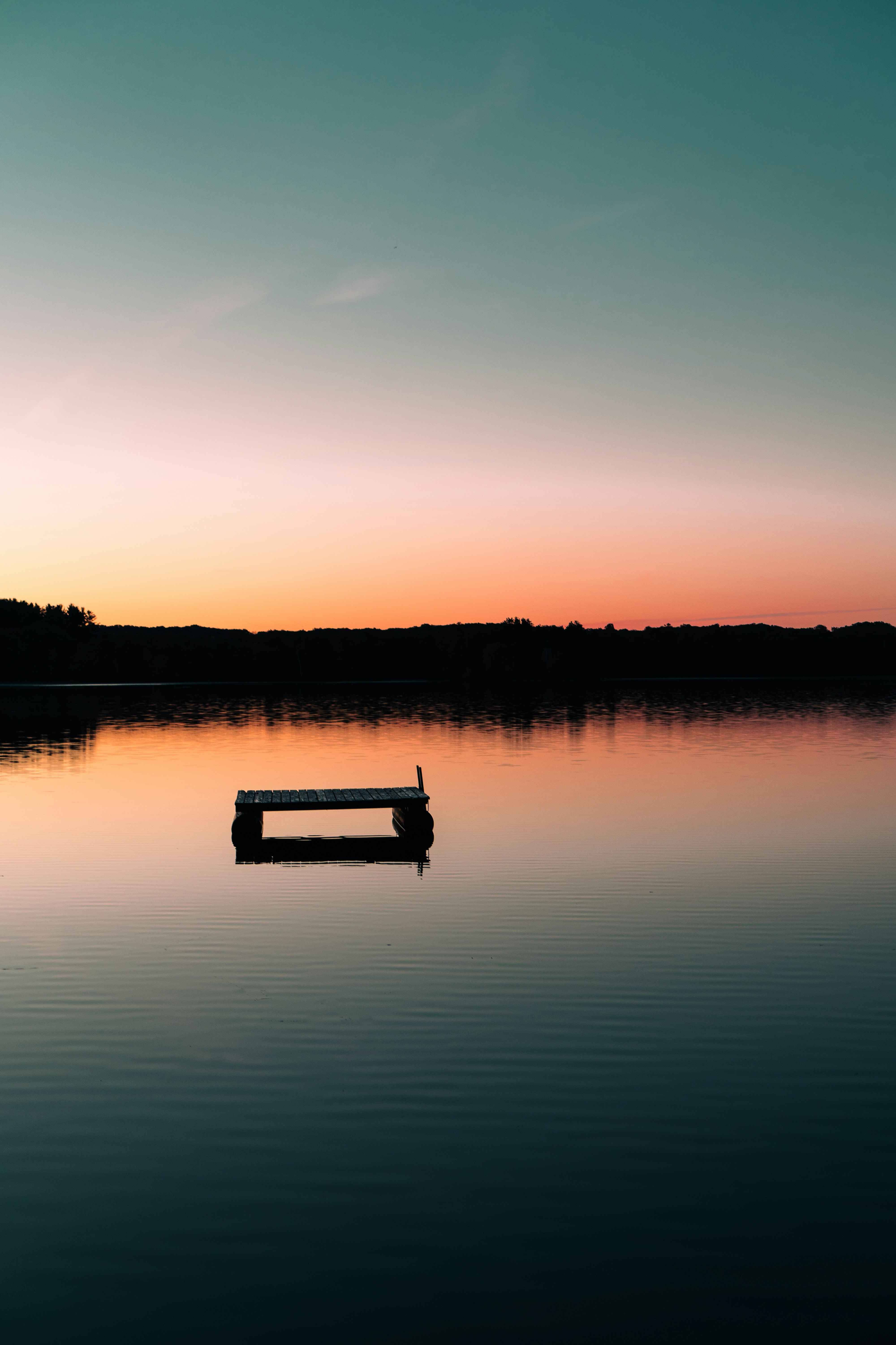 Sunrise over a raft in Lake