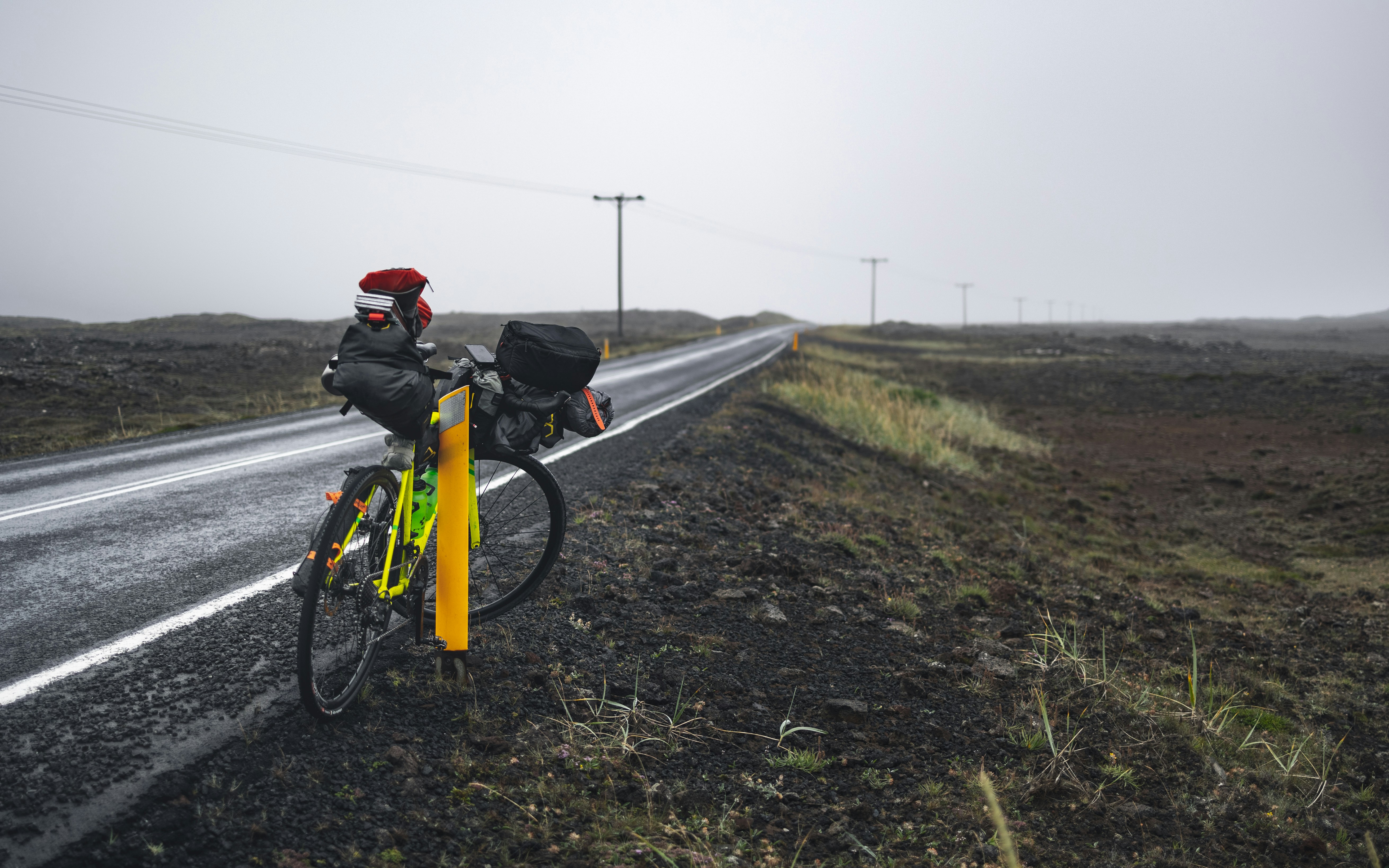 a bike parked on the side of a road