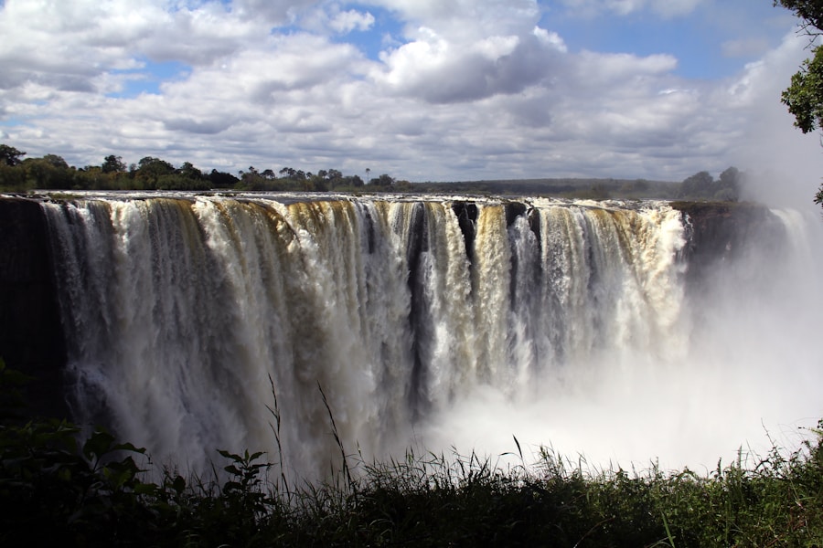 a large waterfall with water pouring out of it