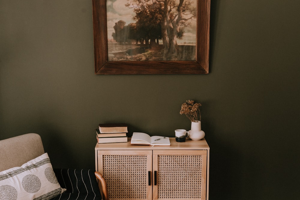 a picture of a room with a chair and a cabinet