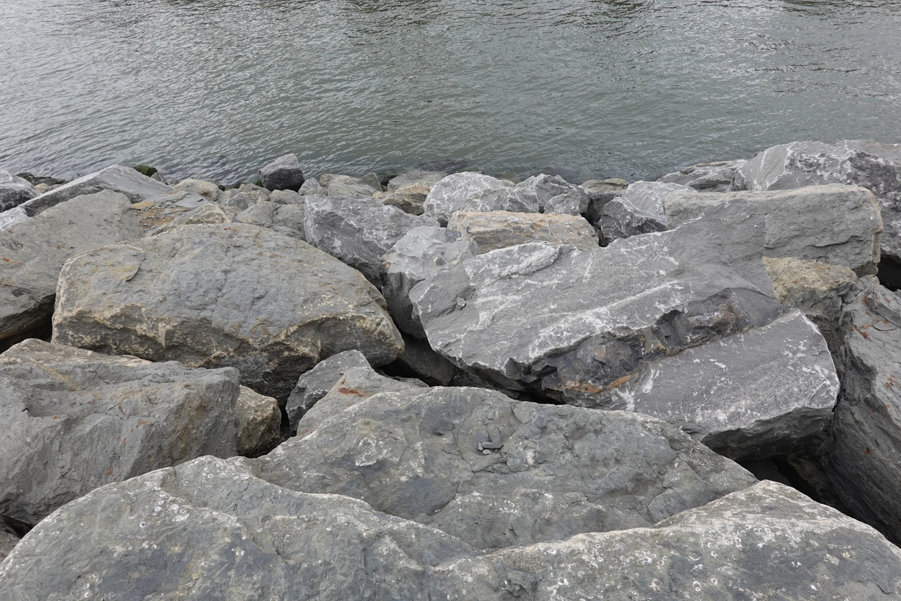 Granite boulders at the water's edge
