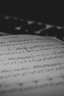 a sheet of music that is laying on a table
