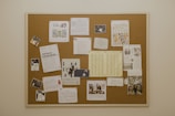 Close-up of a bulletin board filled with academic notices and announcements