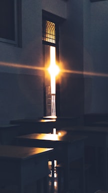 A warm, inviting school entrance bathed in golden sunlight.