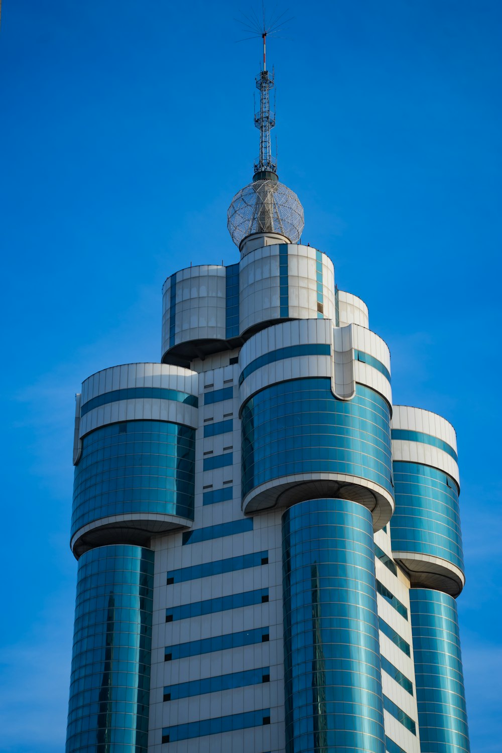 a tall building with a clock on the top of it