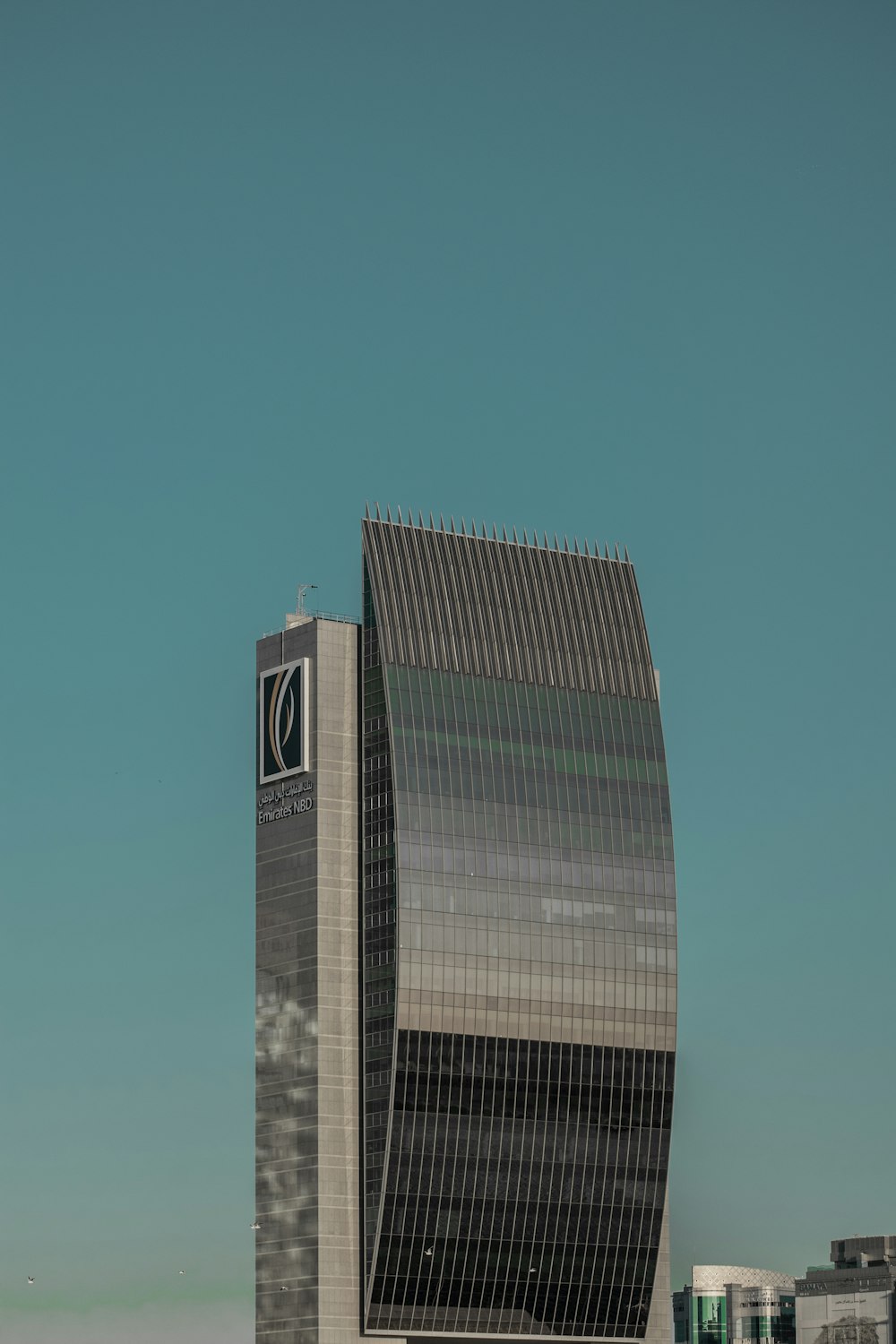 a tall building with a clock on the side of it