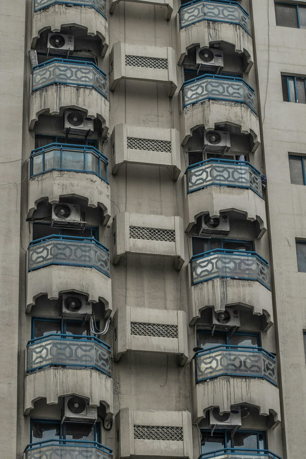 a tall building with balconies and balconies on the balconies