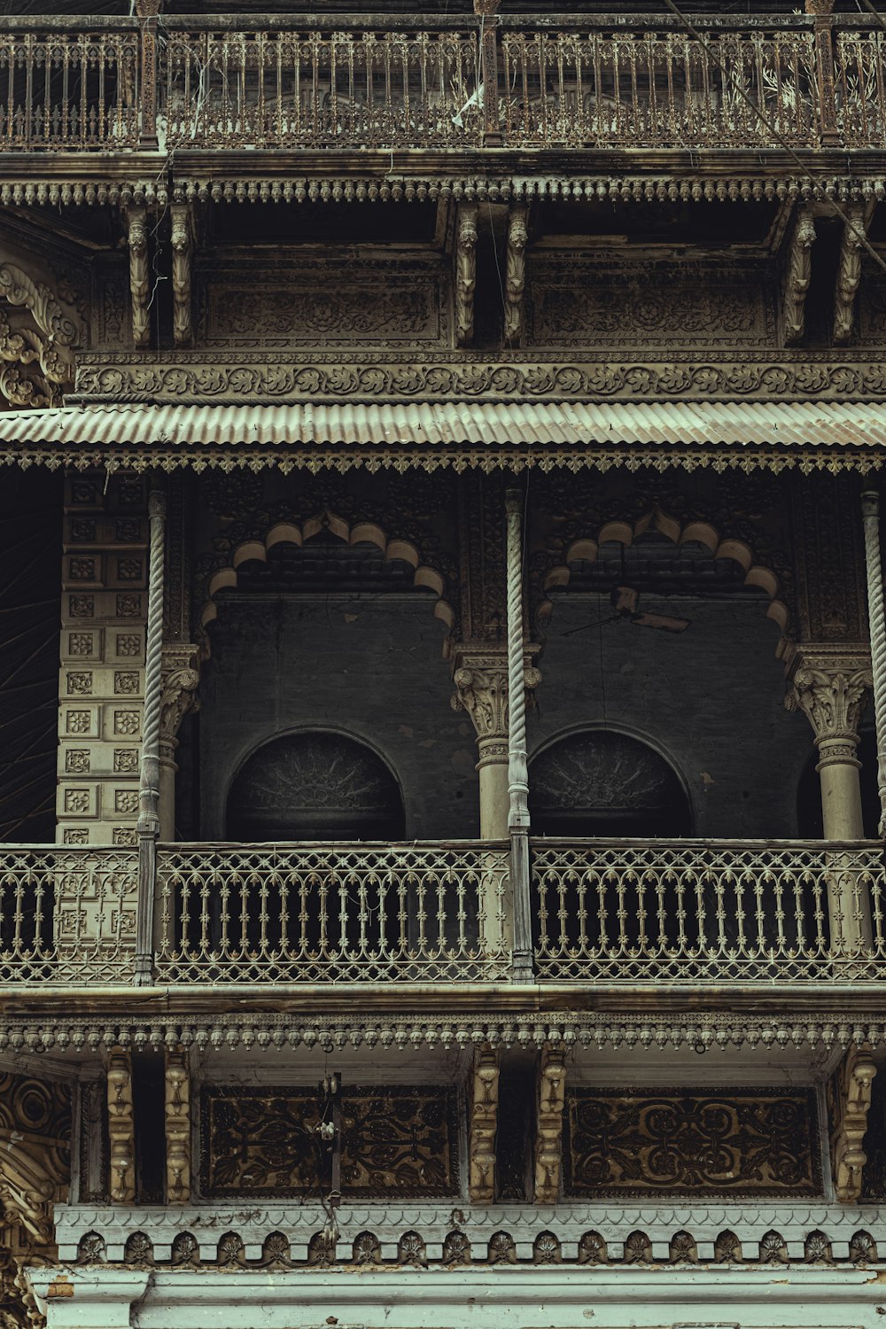 a tall building with a balcony and balconies