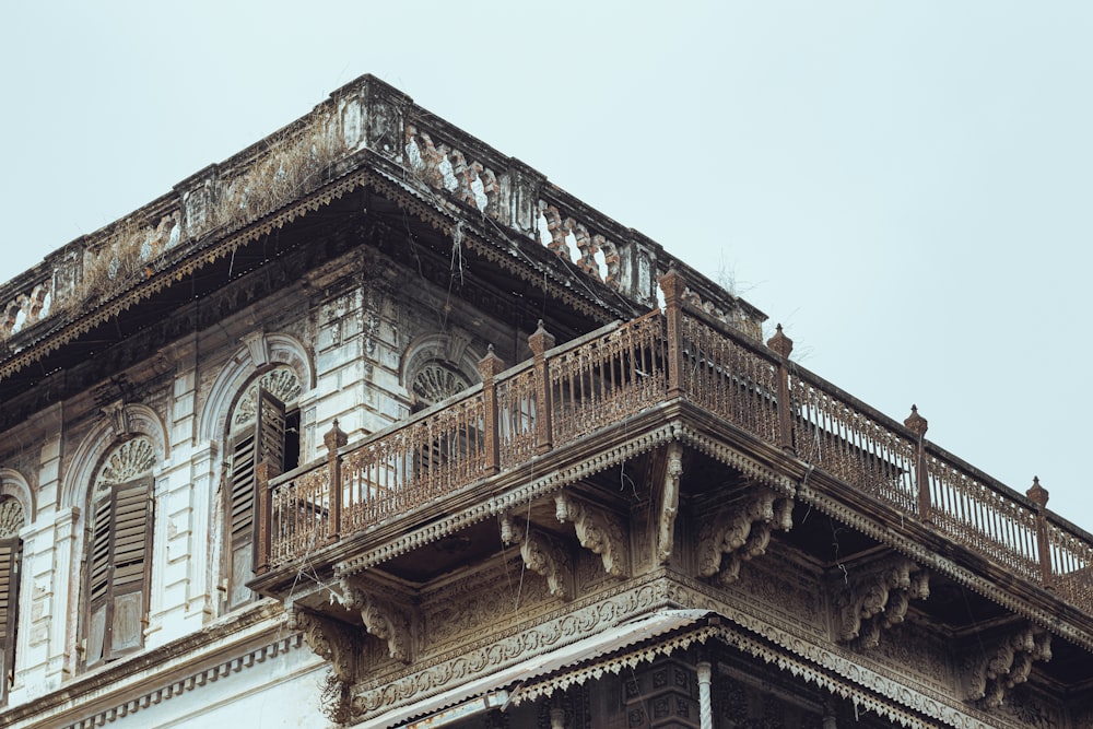 an old building with a balcony and balconies