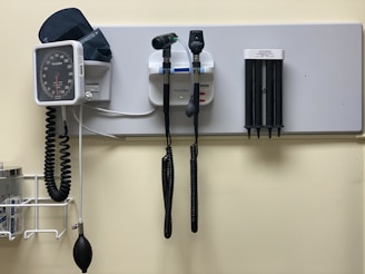 a hospital room with a wall mounted medical equipment