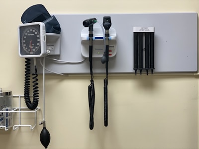 a hospital room with a wall mounted medical equipment