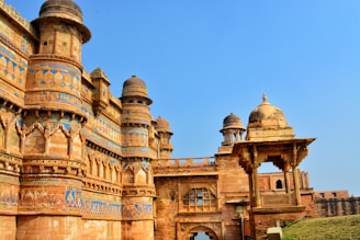 a large building with many towers on top of it