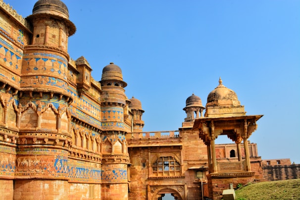 The historic Rampur Fort standing tall against a clear blue sky, showcasing its intricate architecture.
