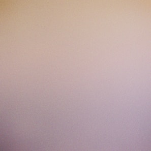 Soft fade transition between ivory and burnt amber tones with a hint of slate accents