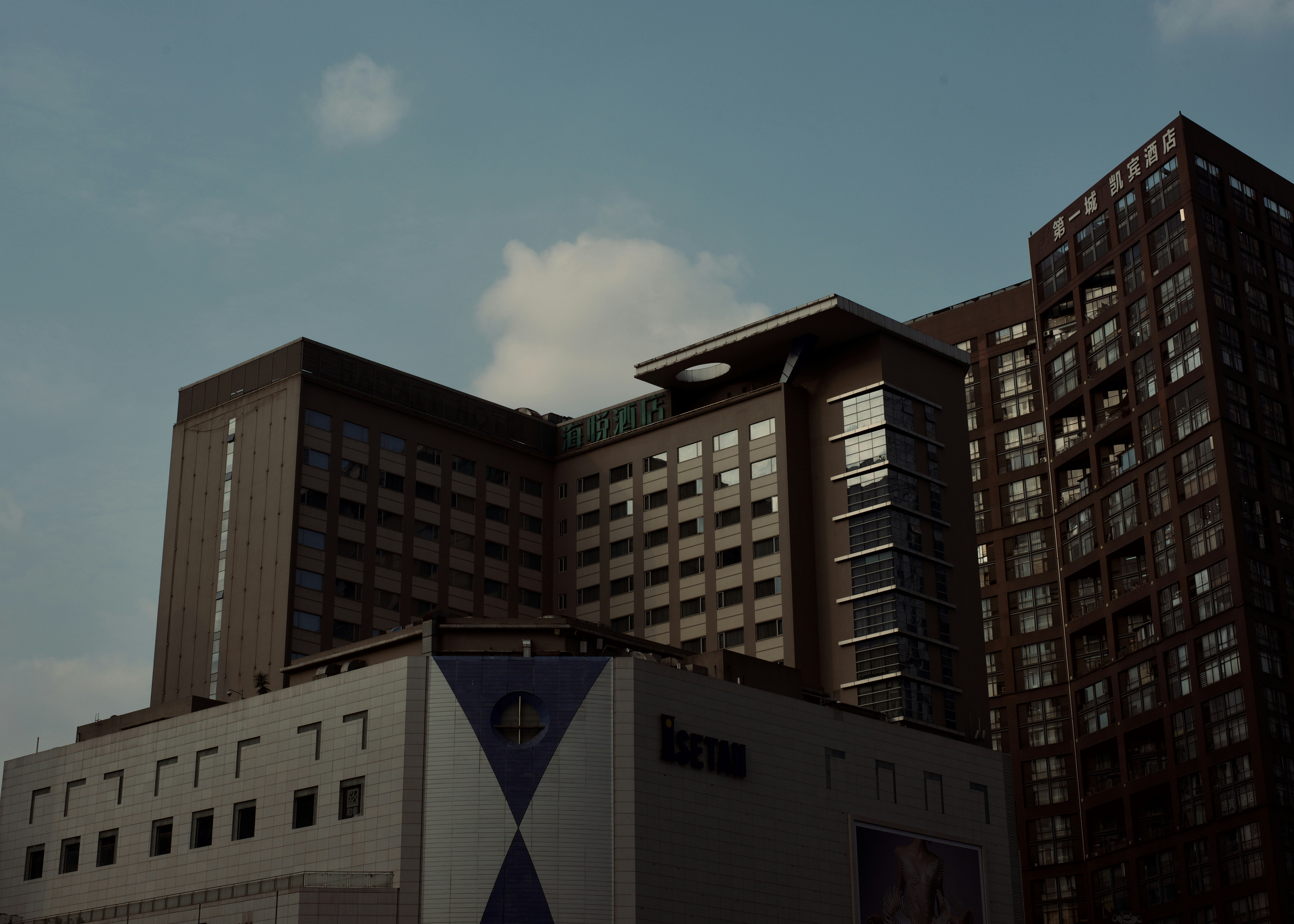 a tall building with a clock on the top of it