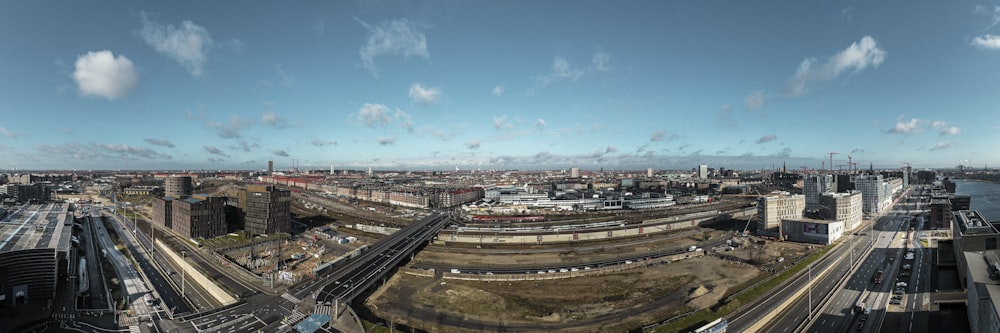 a panoramic view of a city with a river running through it