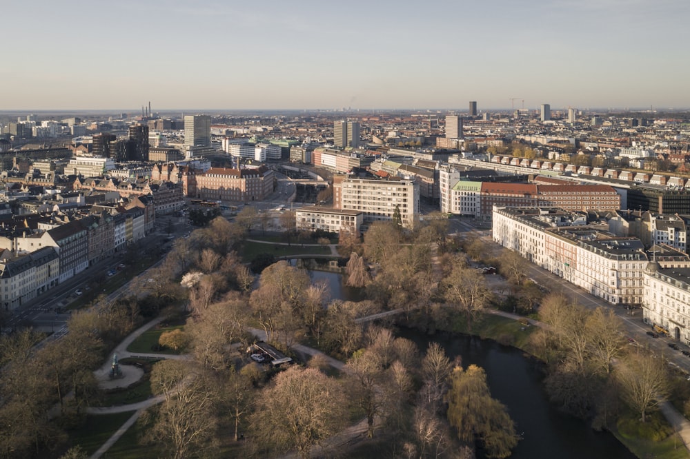 an aerial view of a city with a river running through it