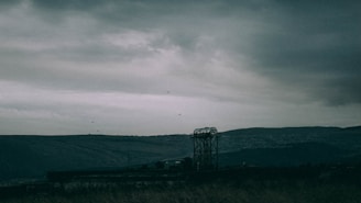 A dark, moody landscape of Siwan, highlighting its neglected state.