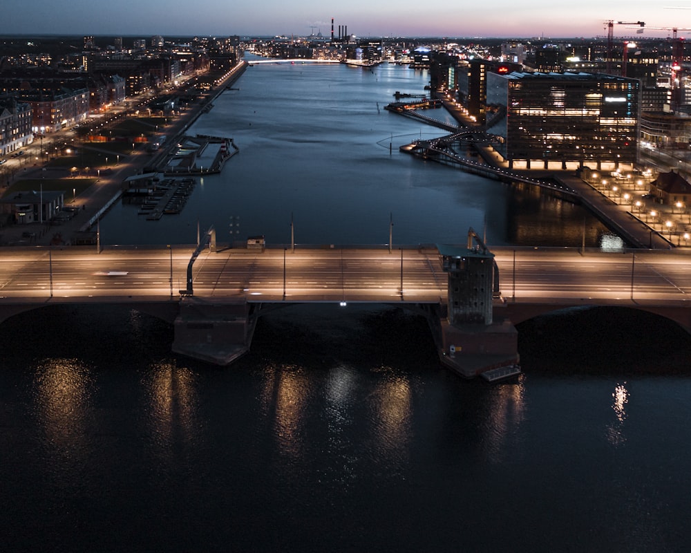 a bridge over a body of water at night