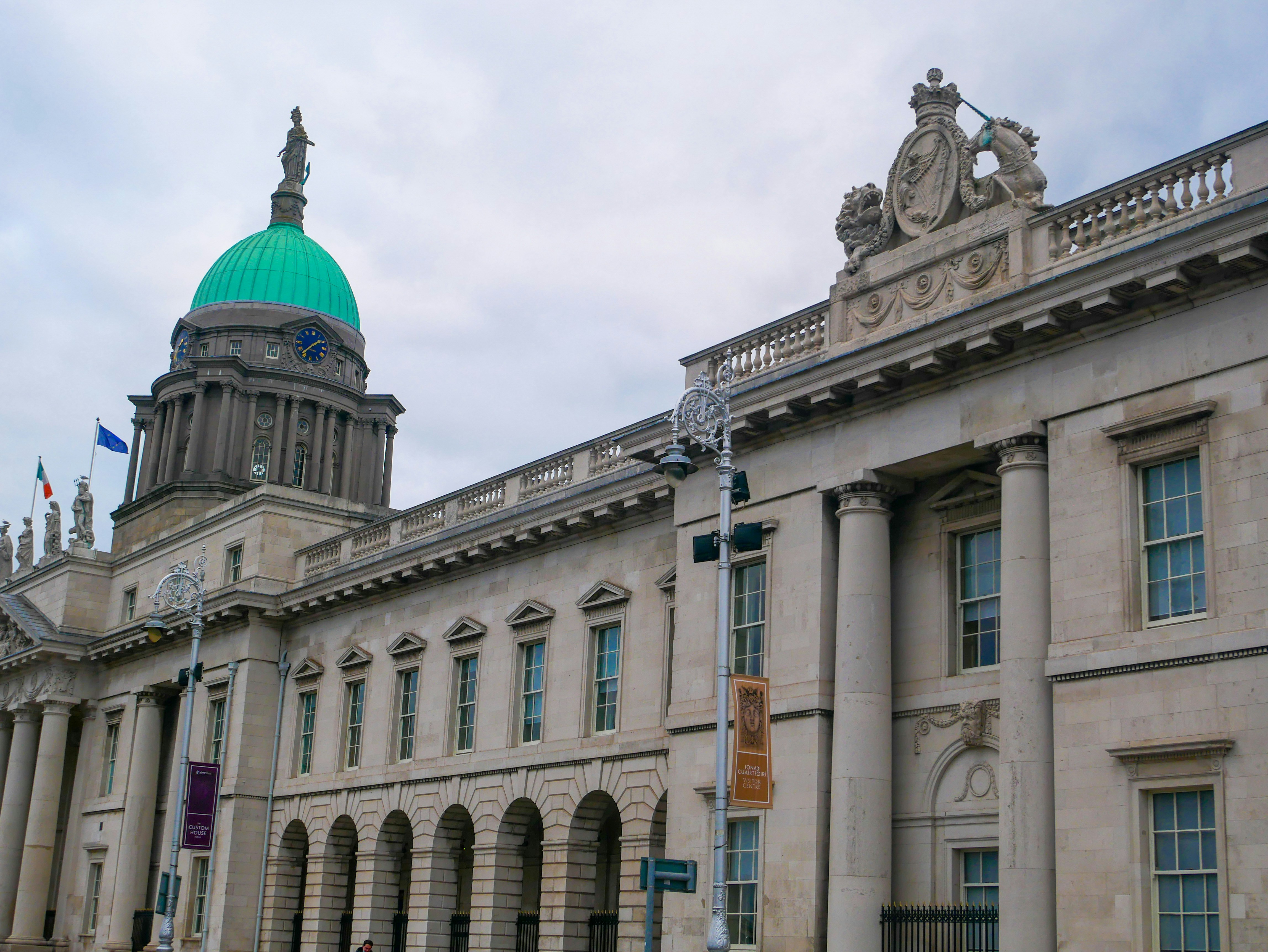 a large building with a green dome on top, 