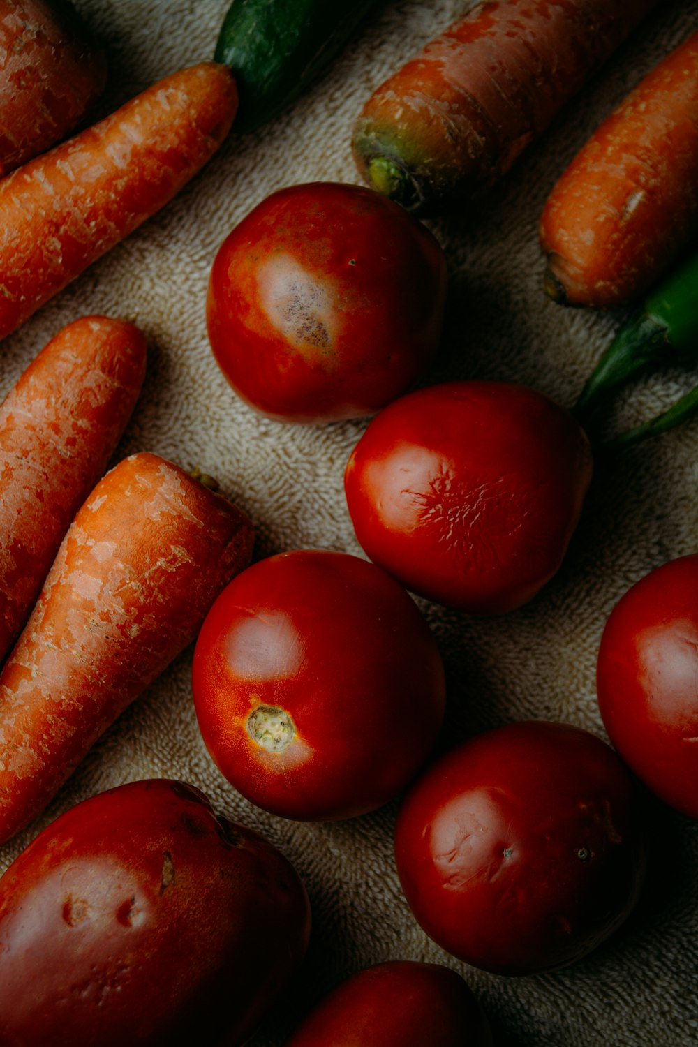 a table topped with lots of different types of vegetables