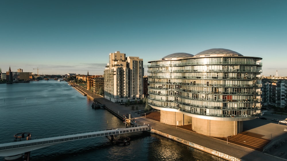 a large building next to a body of water