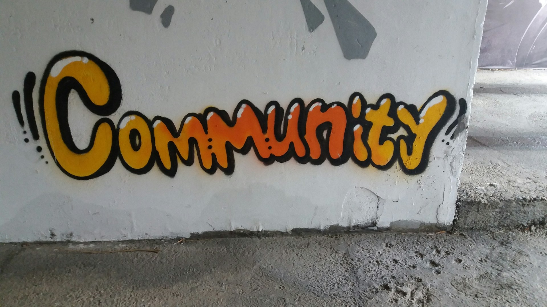 a wall that has some graffiti on it