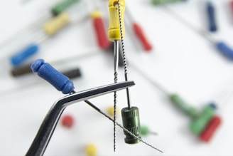 a close up of a metal object with pins and needles